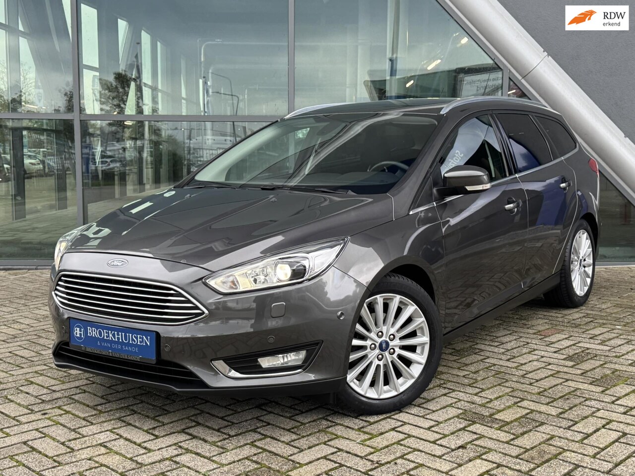 Ford Focus Wagon - 1.0 Titanium Edition125pk Cruise Control / Navigatie / Climate control - AutoWereld.nl