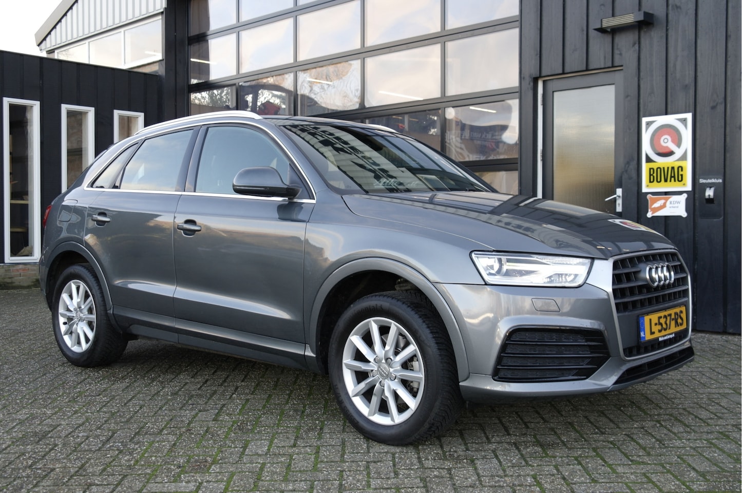 Audi Q3 - 1.4 TFSI Design | Cruise | Navi | Stoelverwarming | Airco | Xenon - AutoWereld.nl