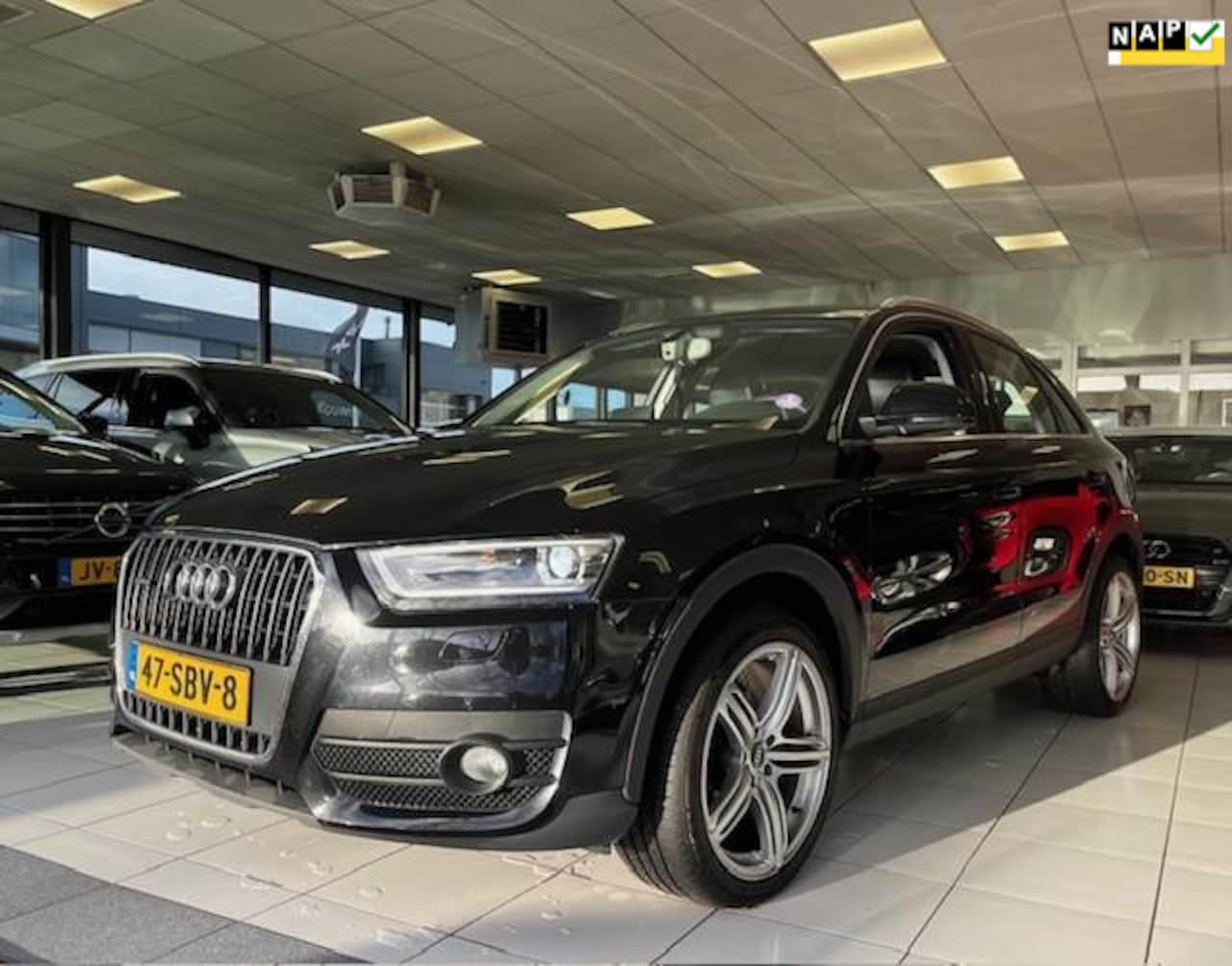Audi Q3 - 2.0 TFSI quattro/Dealer onderhouden/Automaat/NAP/Navi/Stoelverwarming - AutoWereld.nl