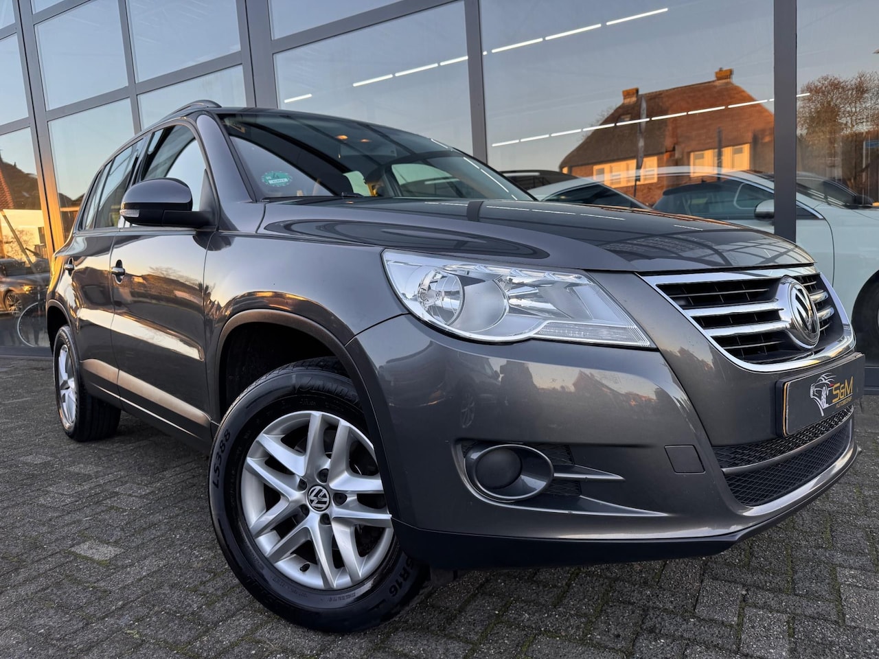 Volkswagen Tiguan - 1.4 TSI Comfort&Design | Camera - AutoWereld.nl