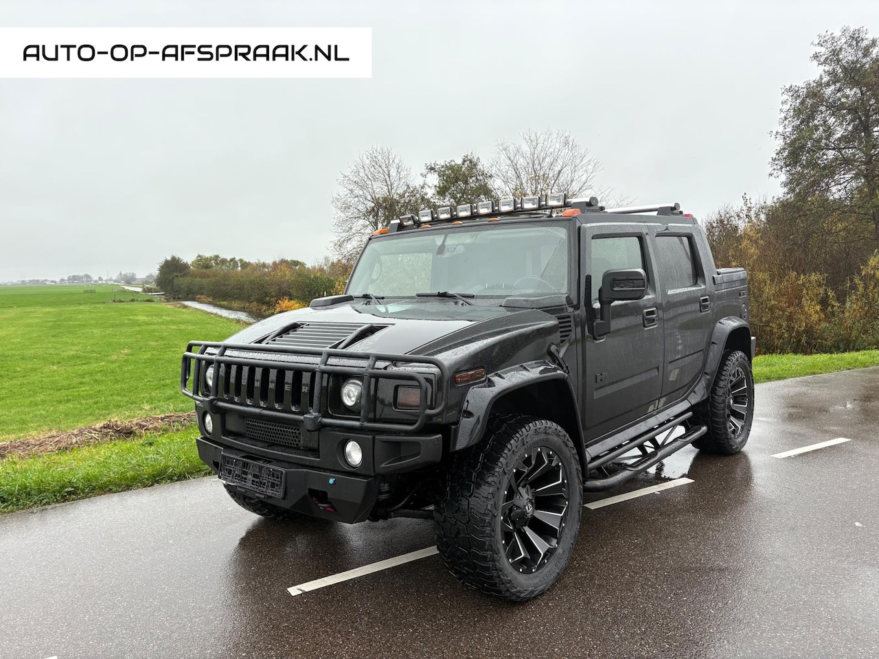 Hummer H2 - 6.0 V8 SUT Special Edition Black Ops - AutoWereld.nl