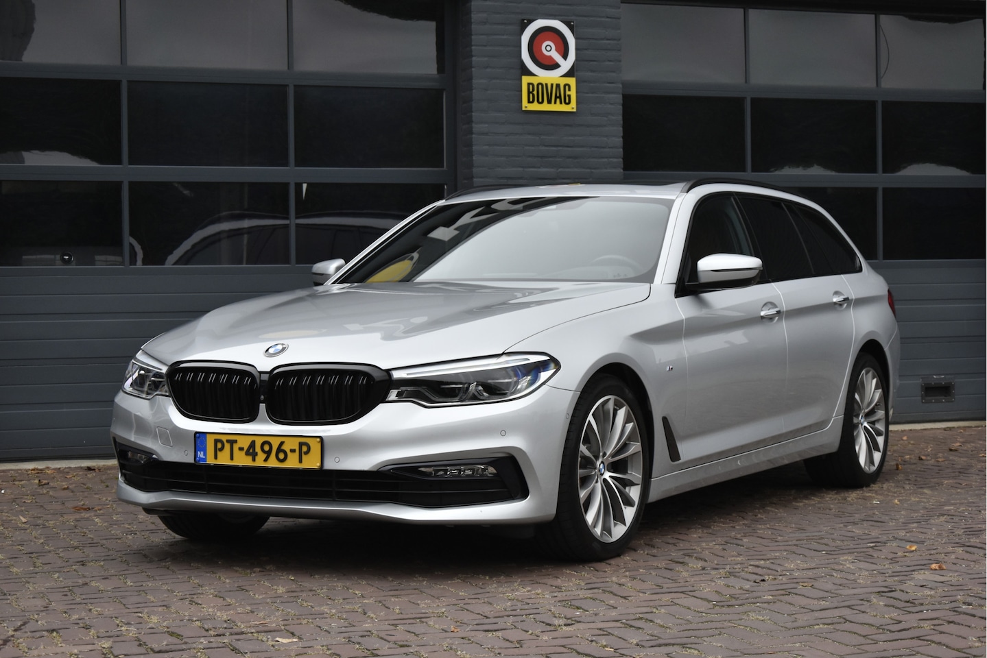 BMW 5-serie Touring - 520i High Executive Sportline - AutoWereld.nl
