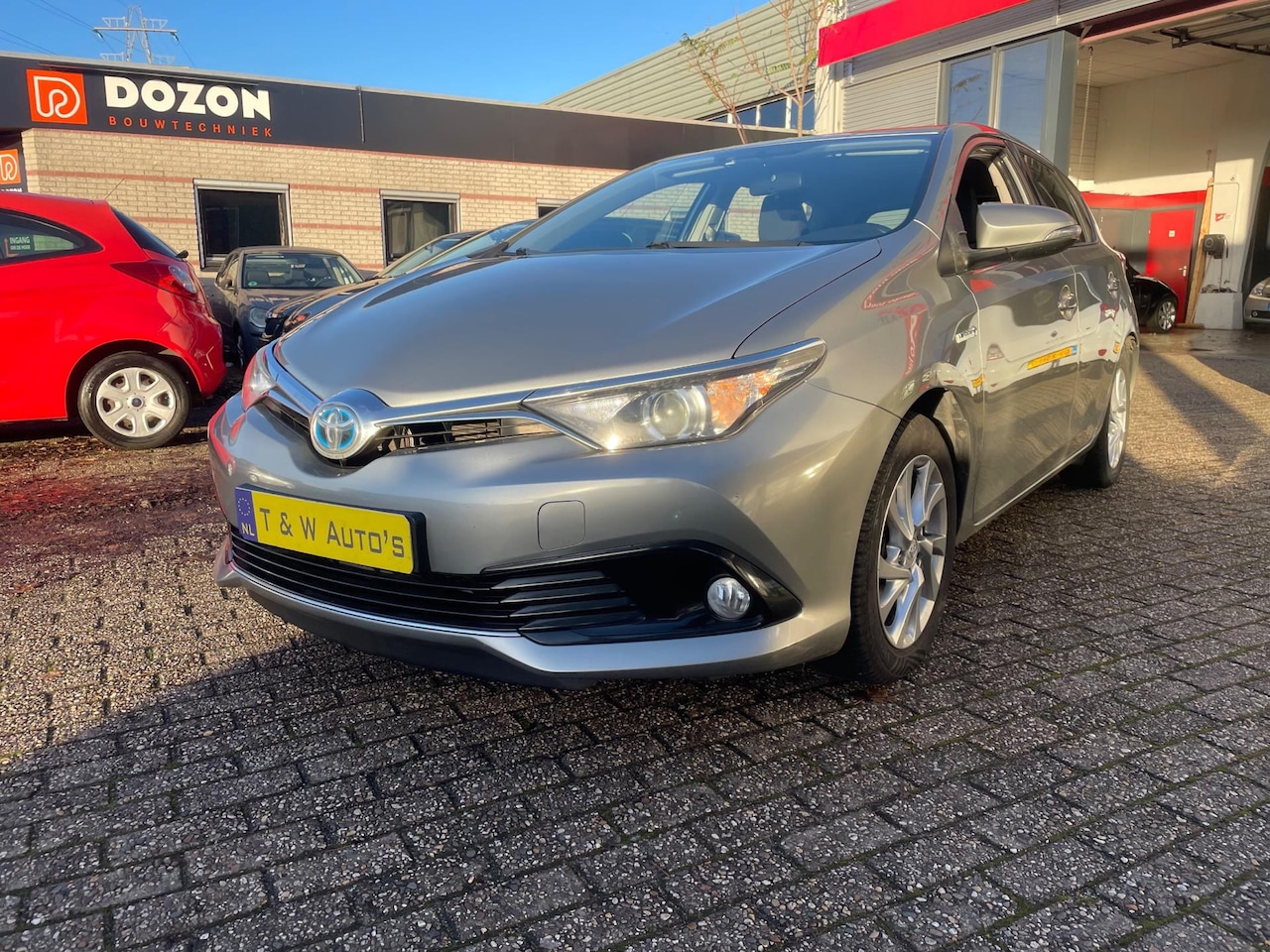 Toyota Auris - 1.8 Hybrid Executive facelift in top staat - AutoWereld.nl
