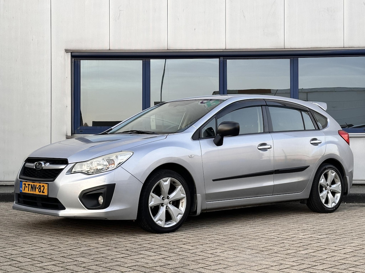 Subaru Impreza - AWD Sport Hatchback l Uniek l Automaat l 4WD l - AutoWereld.nl