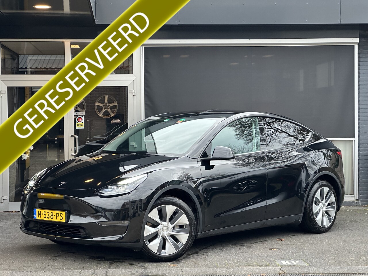 Tesla Model Y - Long Range AWD 75 kWh DUAL MOTOR  / AUTOPILOT / TREKHAAK / STOEL & STUURVERW / PANO - AutoWereld.nl