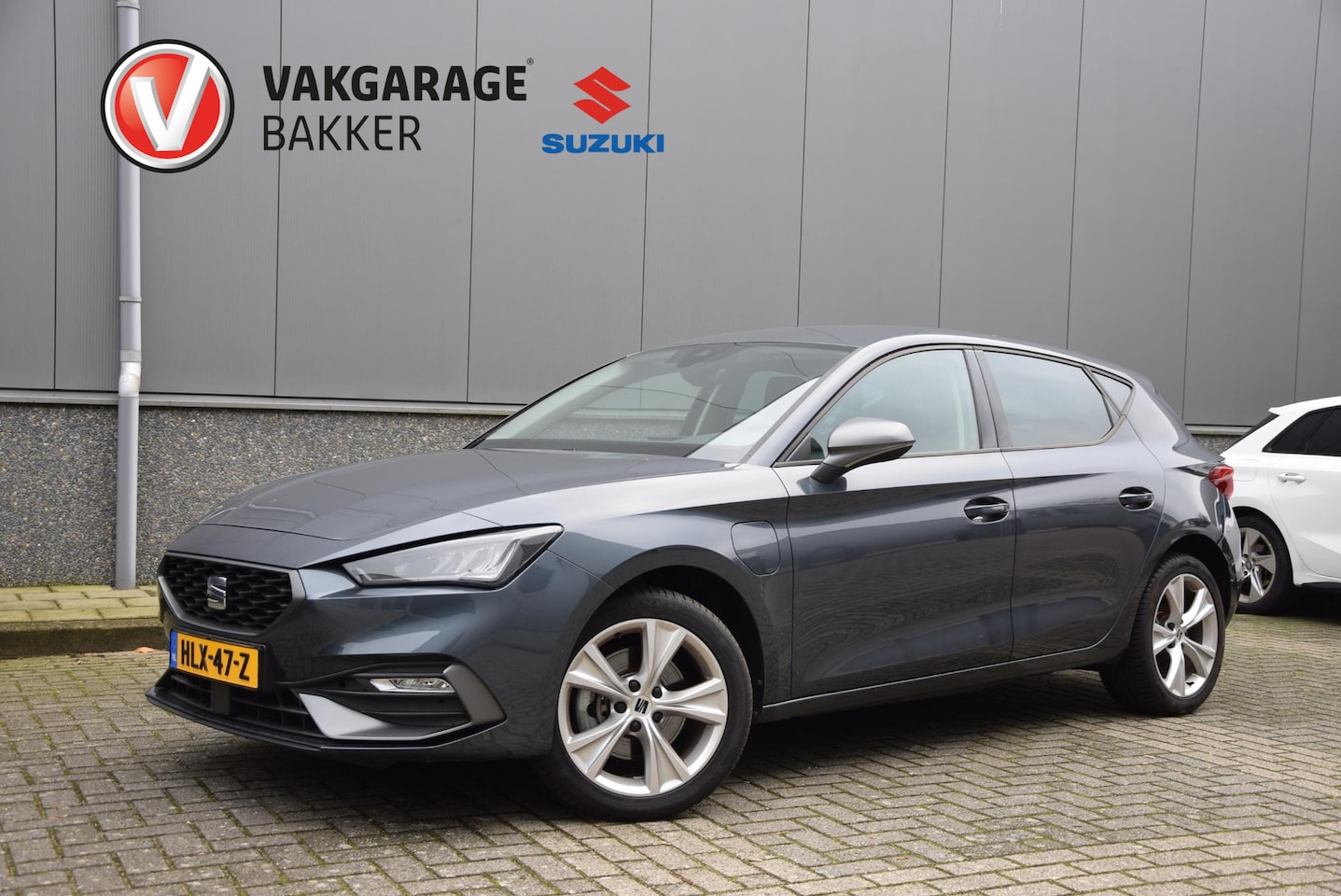 SEAT Leon Sportstourer - 1.4 TSI eHybrid PHEV FR | SOH 100%| stuurwiel verwarmd | lederen/stof bekleding | - AutoWereld.nl