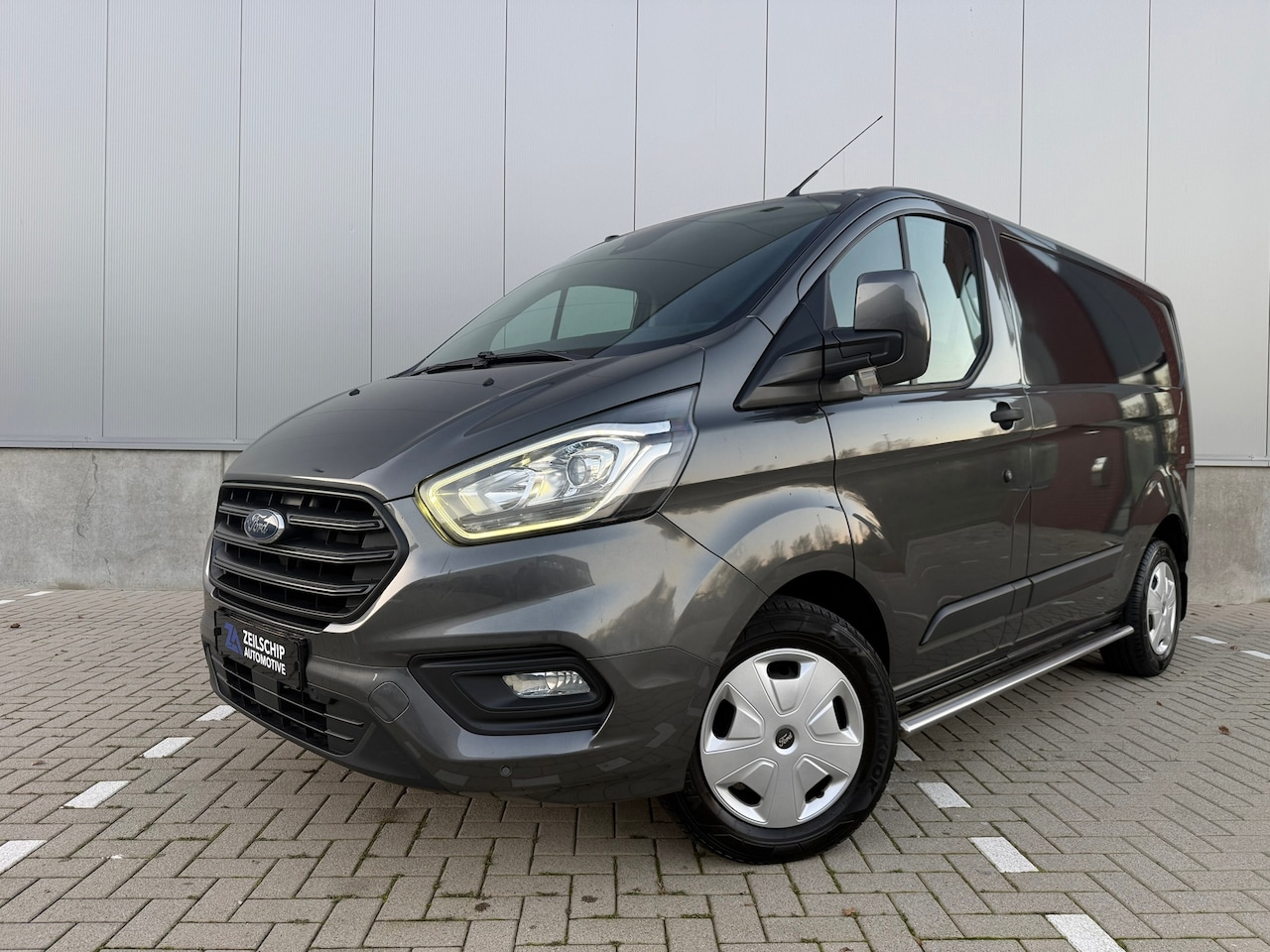 Ford Transit Custom - 280 2.0 TDCI L1H1 AUTOMAAT|TREKHAAK|CAMERA|PDC|NAP| - AutoWereld.nl