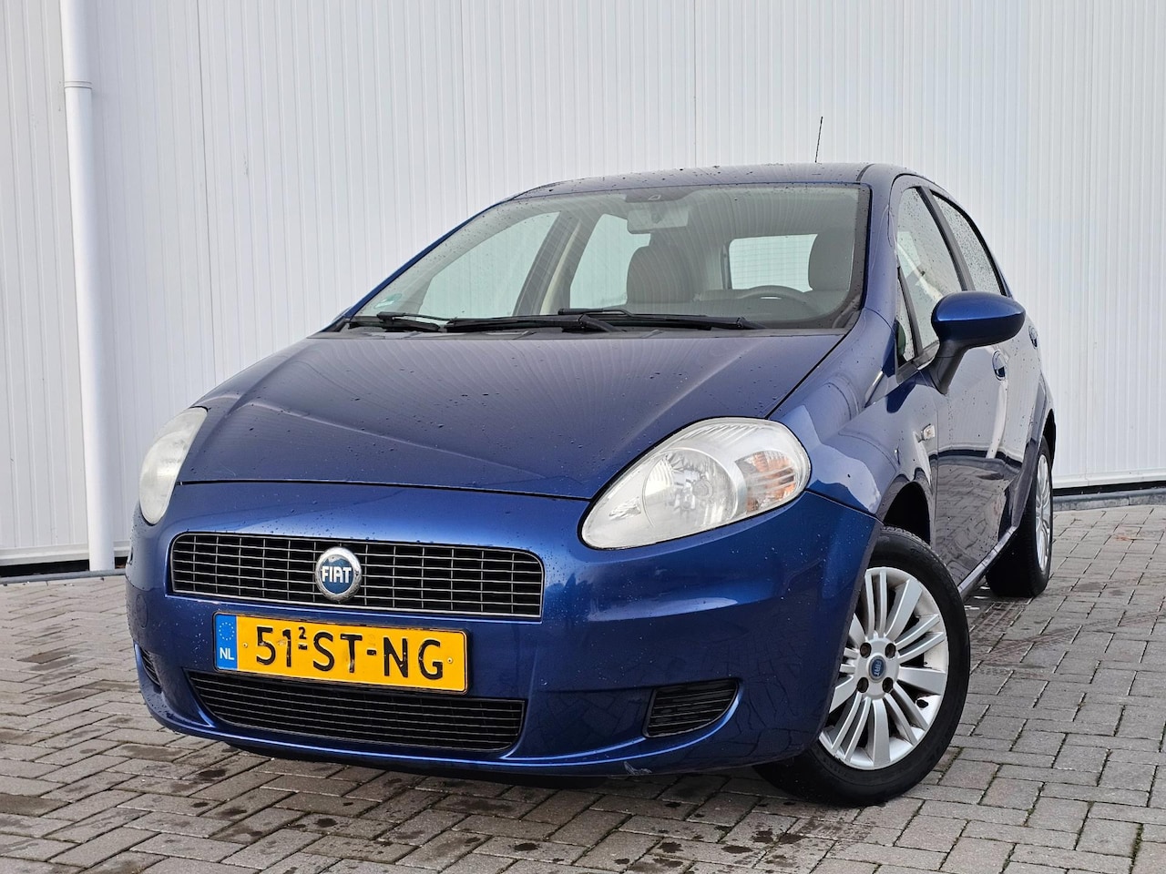 Fiat Grande Punto - 1.4 Edizione Prima bj 2006 5-drs NIEUWE APK 27-10-2026 Airco! - AutoWereld.nl