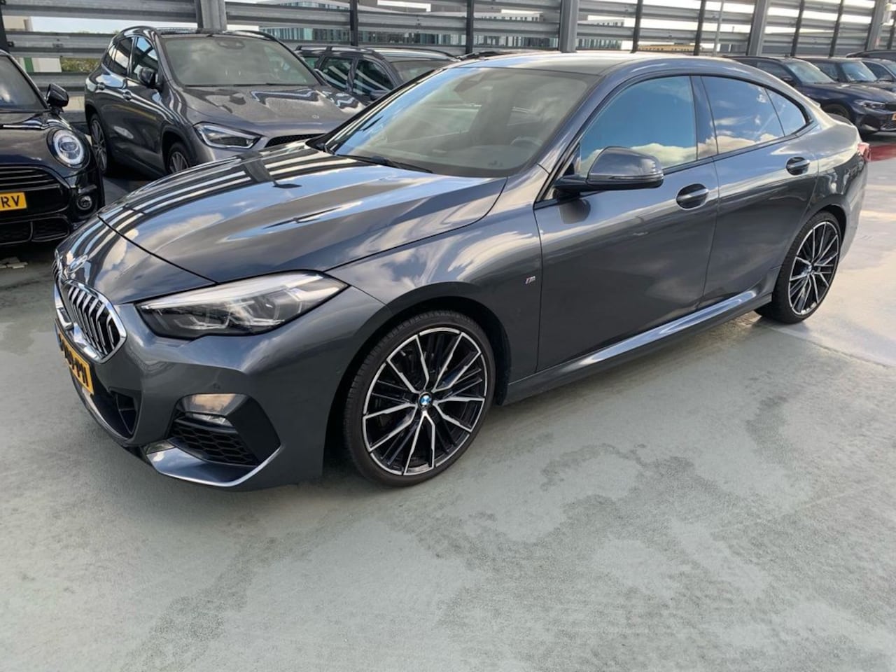 BMW 2-serie Gran Coupé - 218i High Executive | Achterbank in delen neerklapbaar | Achteruitrijcamera | Apple Carpla - AutoWereld.nl