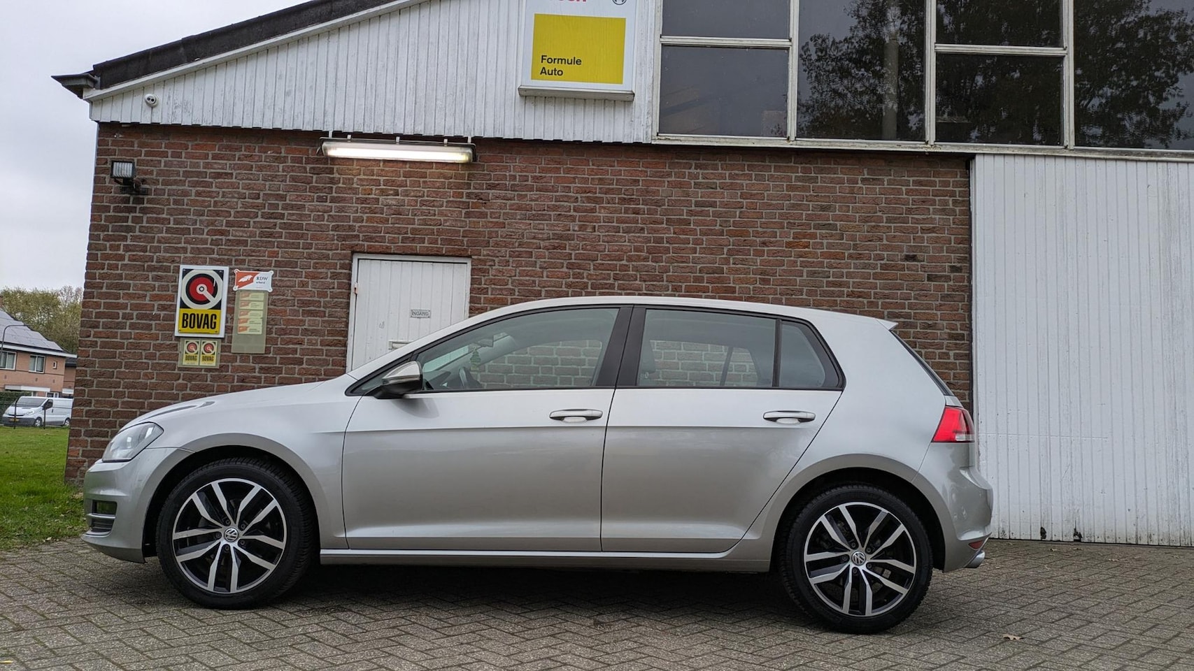 Volkswagen Golf - 1.2 TSI Highline - airco - MFL - Navi - AutoWereld.nl