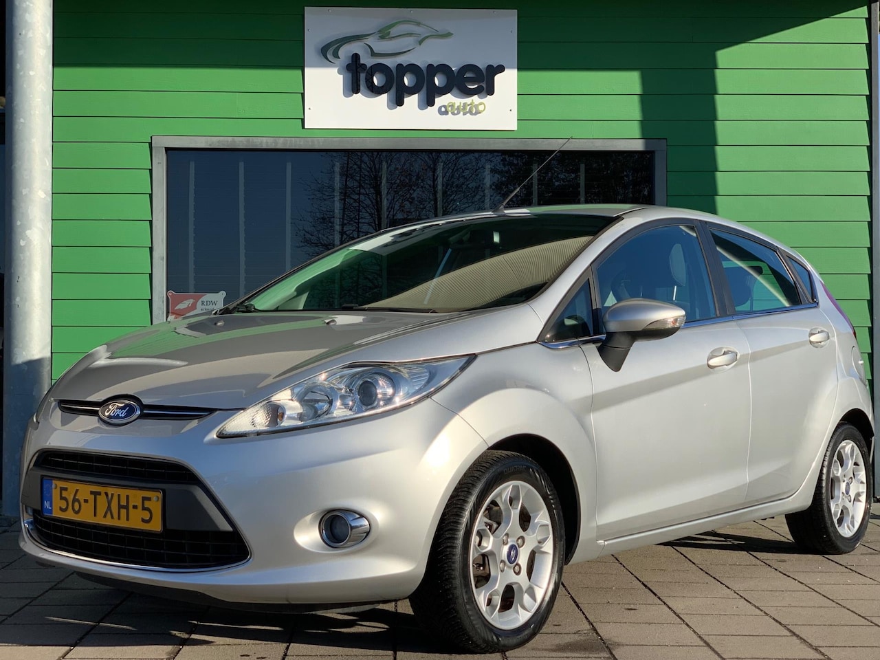 Ford Fiesta - 1.25 Champion | Elektrische Ramen | Airco | Trekhaak | - AutoWereld.nl