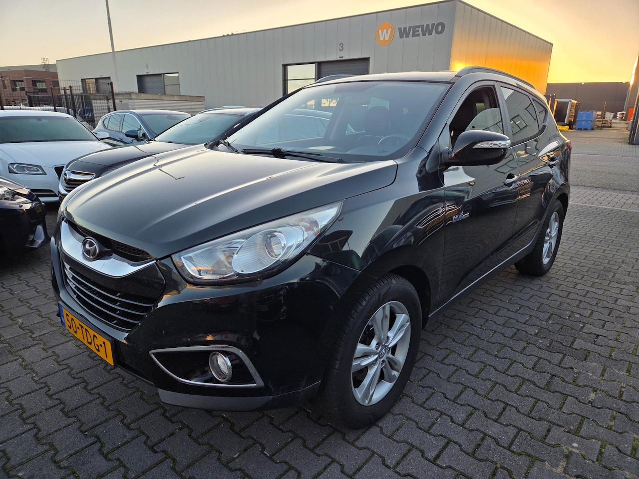 Hyundai ix35 - 1.6i GDI Business Edition Clima/Navi/Camera!! - AutoWereld.nl
