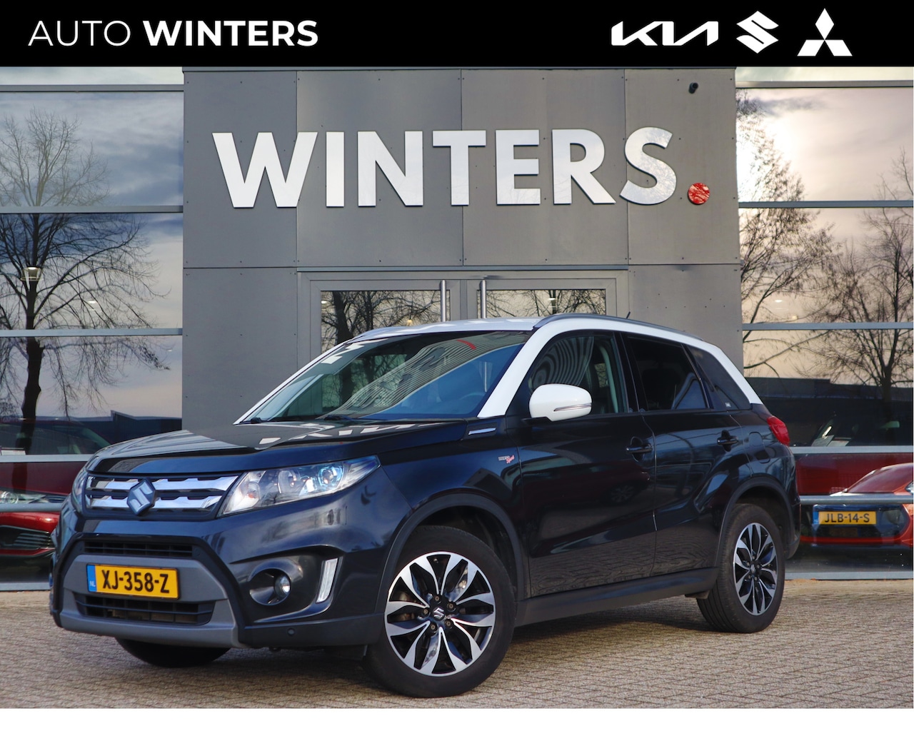 Suzuki Vitara - 1.6 High Executive Navigatie | stoelverwarming | Afneembare trekhaak | Lichtmetalen velgen - AutoWereld.nl