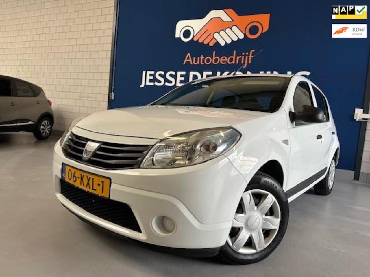 Dacia Sandero - 1.4 Ambiance LPG G3 / bj.2010/ kleur: wit/ 5 deurs/ Airco/ APK tot 09/2026 en NAP met 2567 - AutoWereld.nl