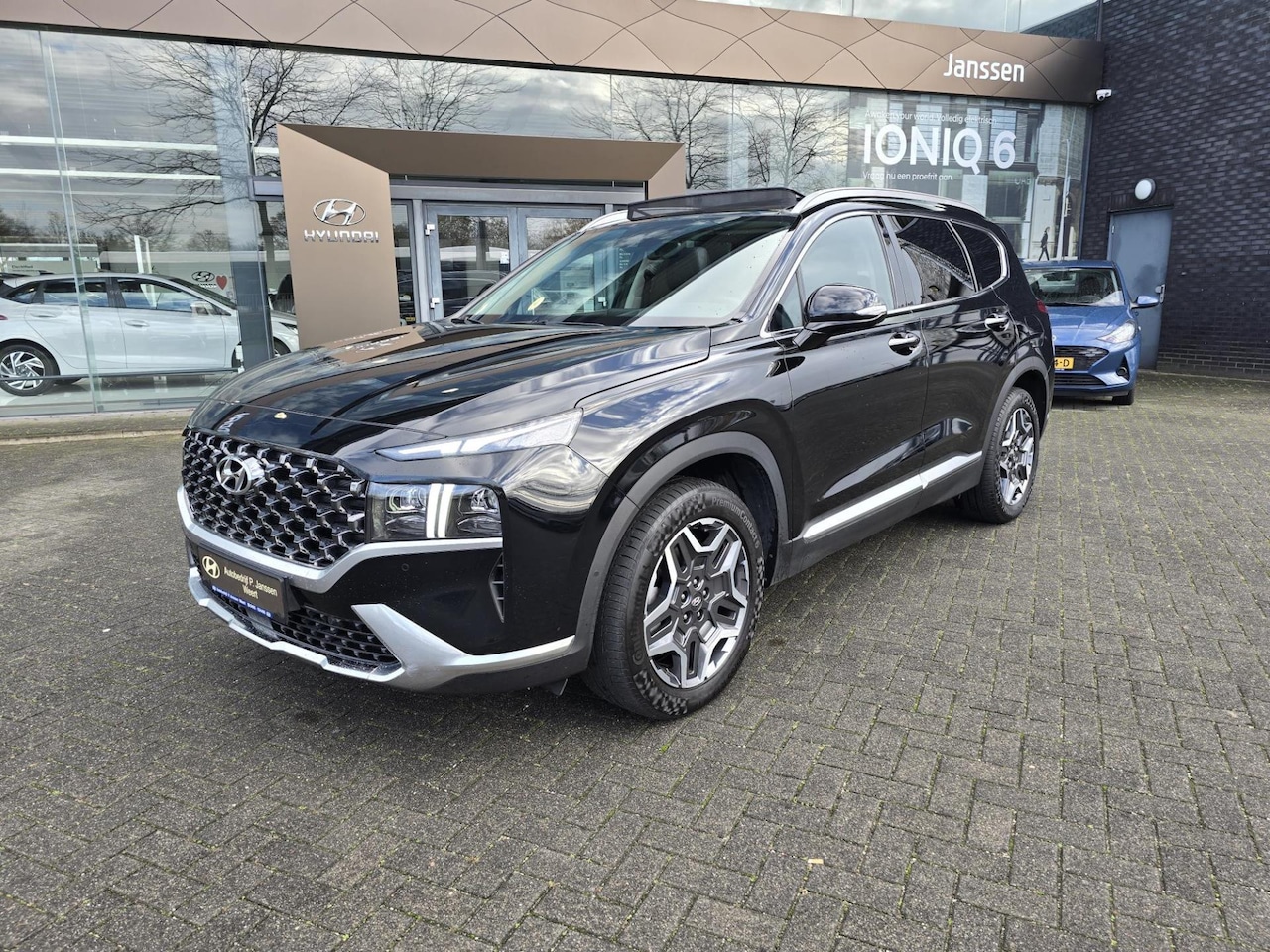 Hyundai Santa Fe - 1.6 T-GDI PHEV Premium Sky 7p. 1.6 T-GDI PHEV Premium Sky 7p. - AutoWereld.nl