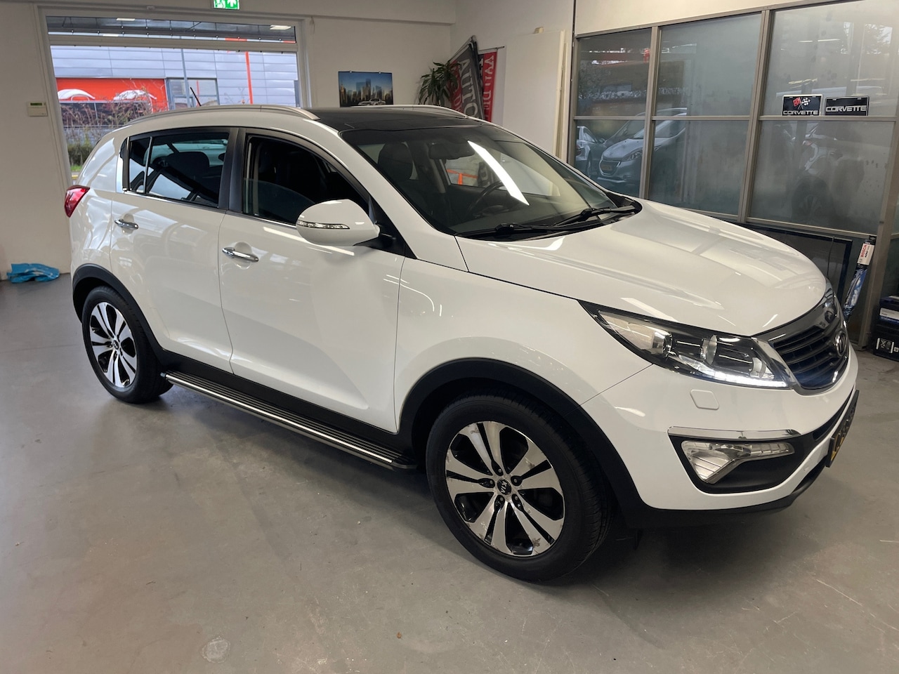 Kia Sportage - 2.0 X-clusive 2.0 X-clusive - AutoWereld.nl
