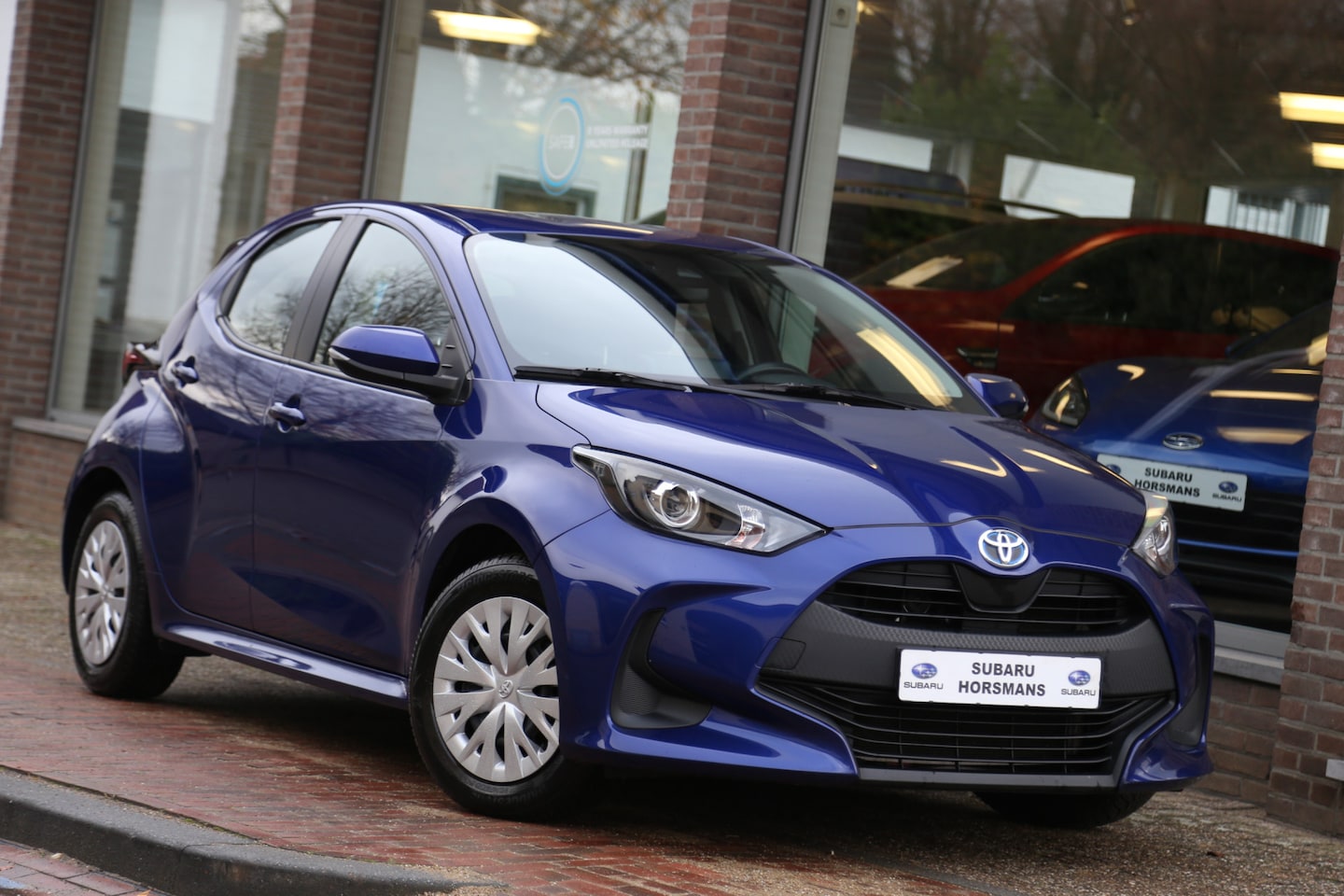 Toyota Yaris - 1.5 Hybrid Active Navi Camera ACC - AutoWereld.nl