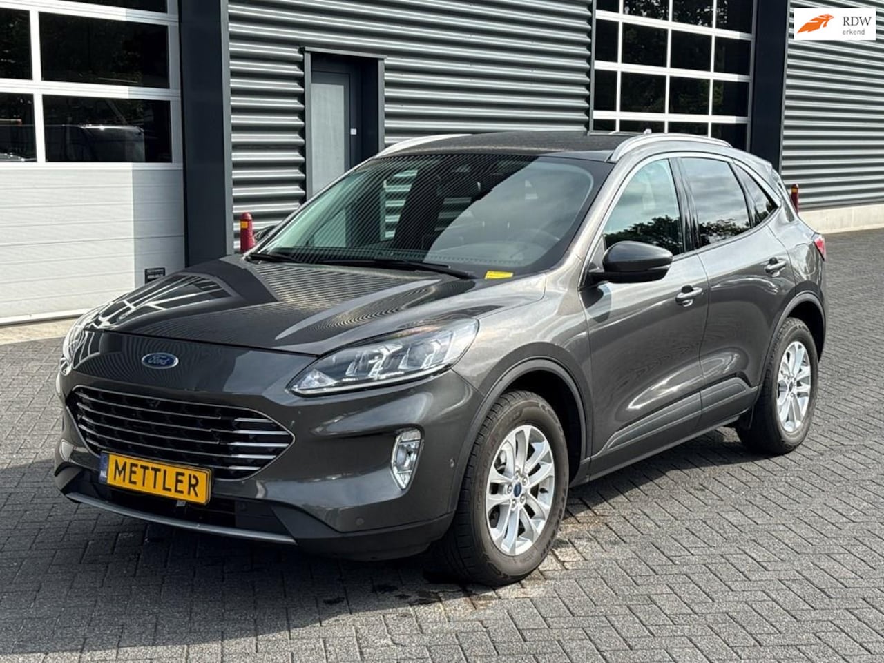Ford Kuga - 1.5 EcoBoost Titanium 1.5 EcoBoost Titanium, Navi, Camera, PDC - AutoWereld.nl