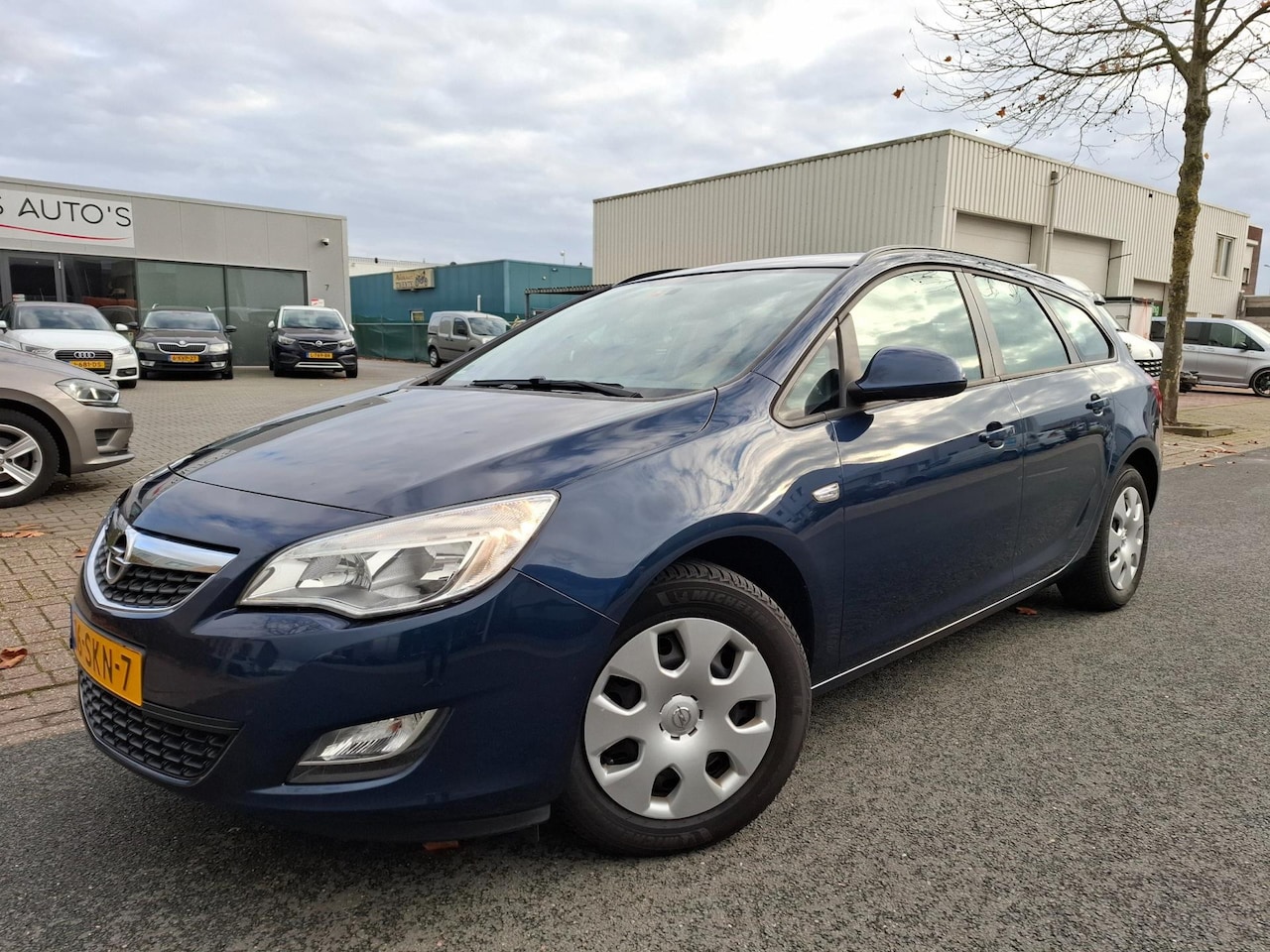 Opel Astra Sports Tourer - 1.4 Turbo Edition AIRCO/CRUISE/NAVI/PDC! - AutoWereld.nl