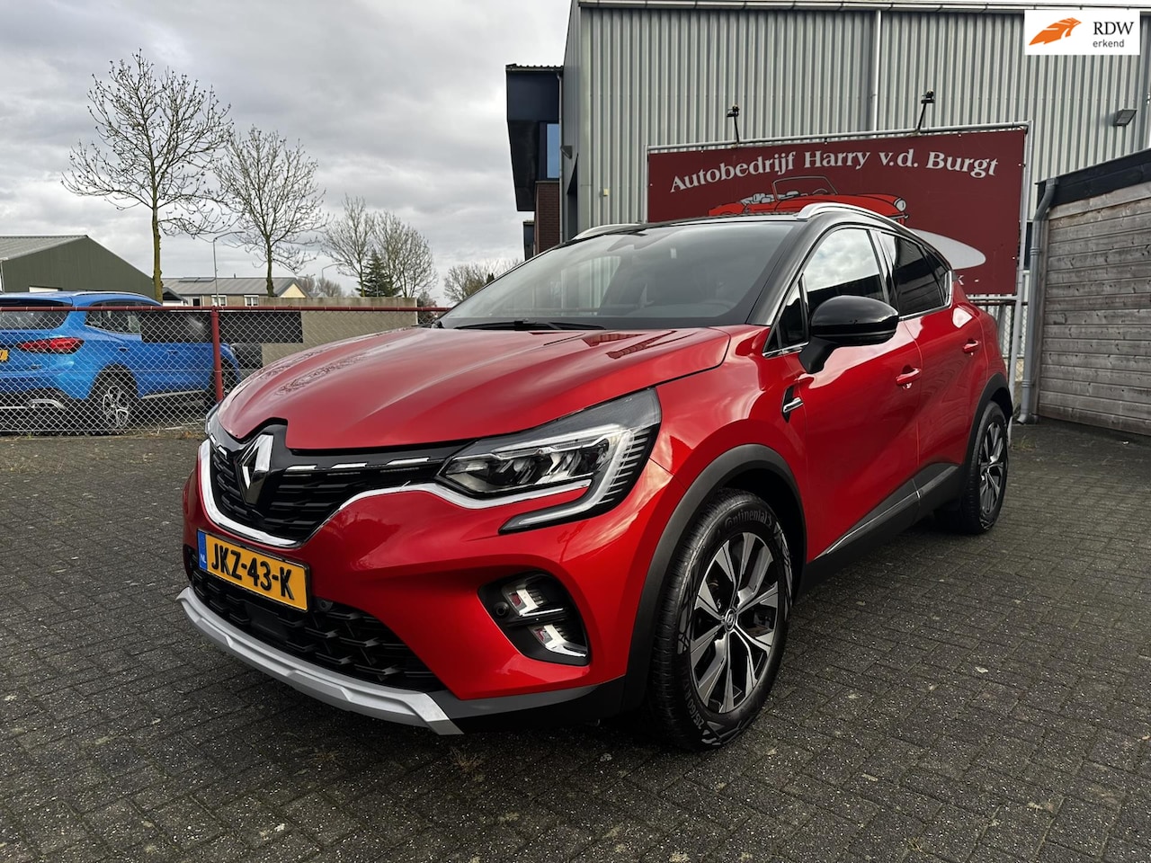 Renault Captur - 1.6 E-Tech Hybrid 145 Intens | Trekhaak | Navigatie | Camera - AutoWereld.nl