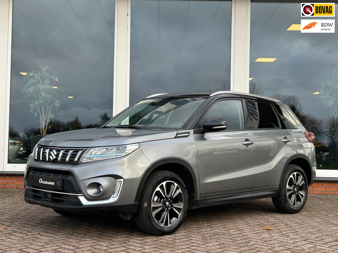 Suzuki Vitara - 1.4 Boosterjet Style Smart Hybrid - Navi - Camera - PDC - Trekhaak - AutoWereld.nl