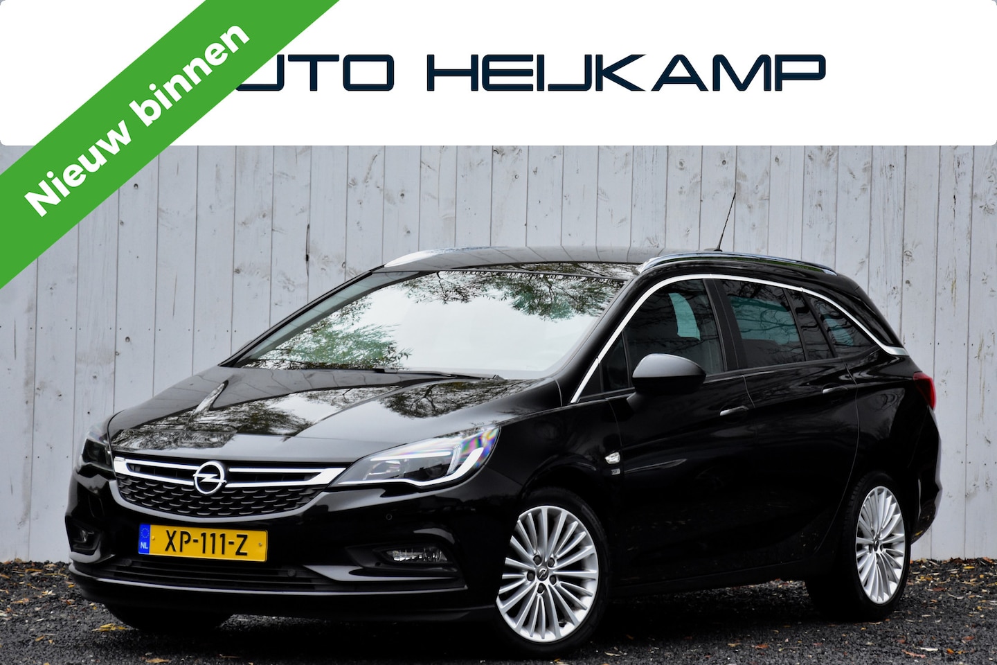 Opel Astra Sports Tourer - 1.4 Turbo 120 Jaar Edition | Navi | 90.760km | NL-Auto | - AutoWereld.nl