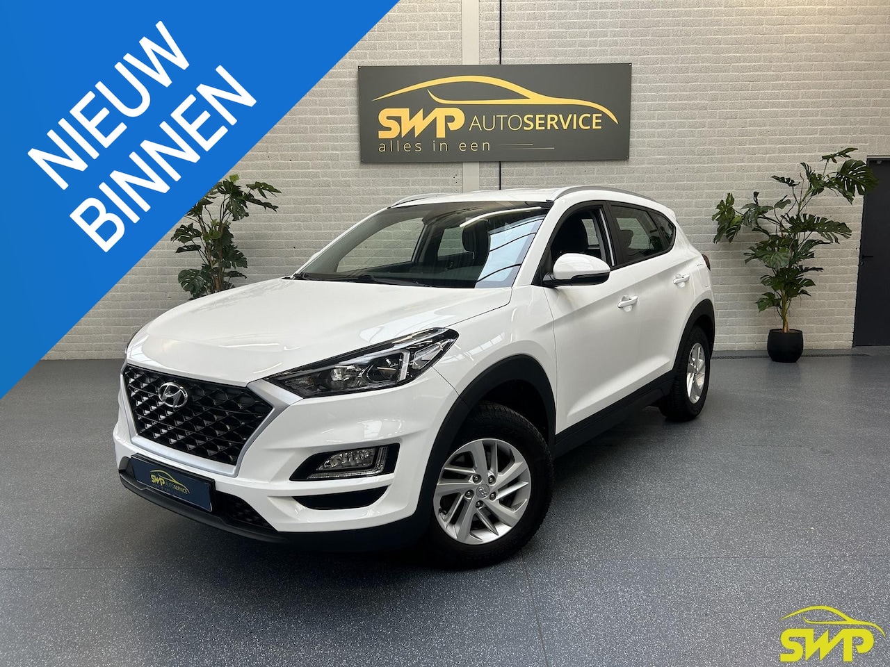 Hyundai Tucson - 1.6 GDI Comfort | Facelift | Trekhaak | Navi via Carplay | Camera | Climate - AutoWereld.nl