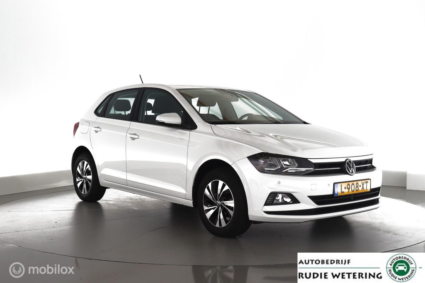 Volkswagen Polo - 1.0 TSI 5 Drs. Comfortline Executive nav|dab|tel|pdc|lmv15 - AutoWereld.nl