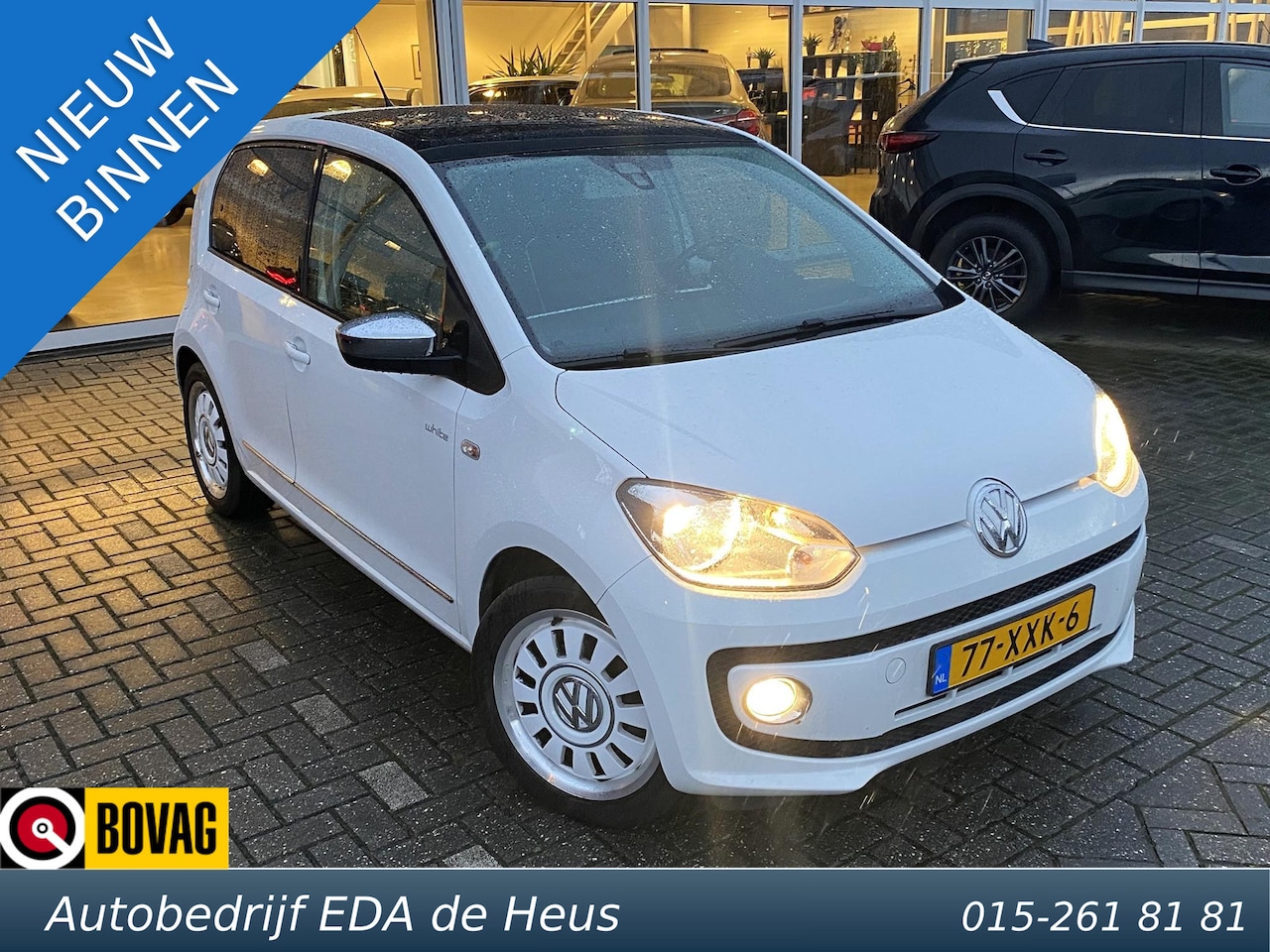 Volkswagen Up! - 5-drs 1.0 High Up! White LUXE! met pano dak, leder pakket, cruise, parkeersens, etc. - AutoWereld.nl