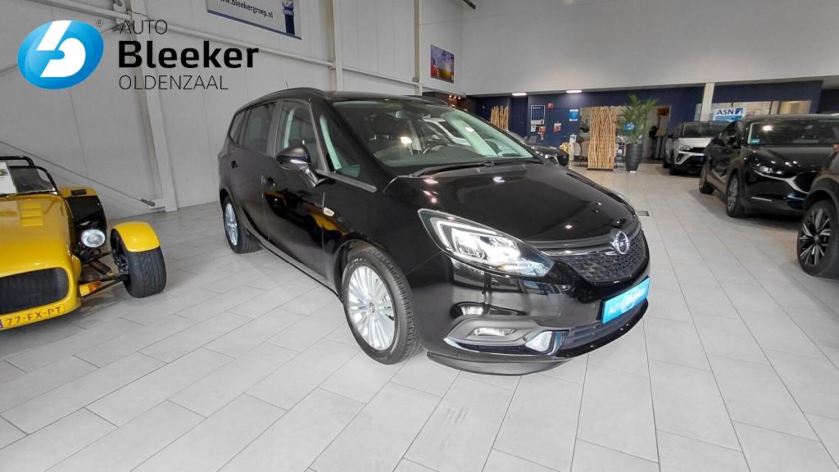 Opel Zafira - 1.4 Turbo Business+ 7P Trekhaak Stoel en Stuurverwarming Cruise Navi Airco - AutoWereld.nl