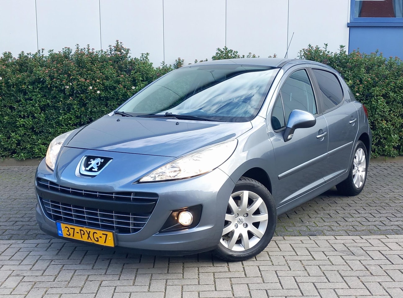 Peugeot 207 - 1.6 VTI 16V 5DR Sportium - AutoWereld.nl