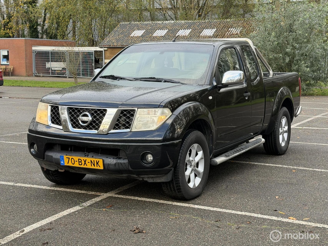 Nissan Navara - 2.5 dCi LE King Cab 4x4 - AutoWereld.nl