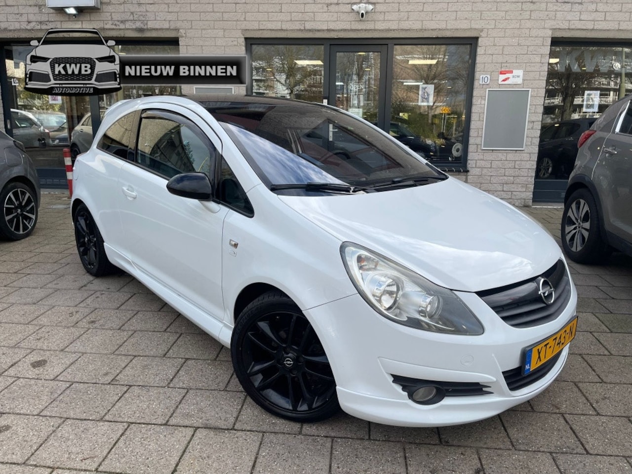 Opel Corsa - 1.4-16V White Edit 3Drs Airco Zwart dak - AutoWereld.nl