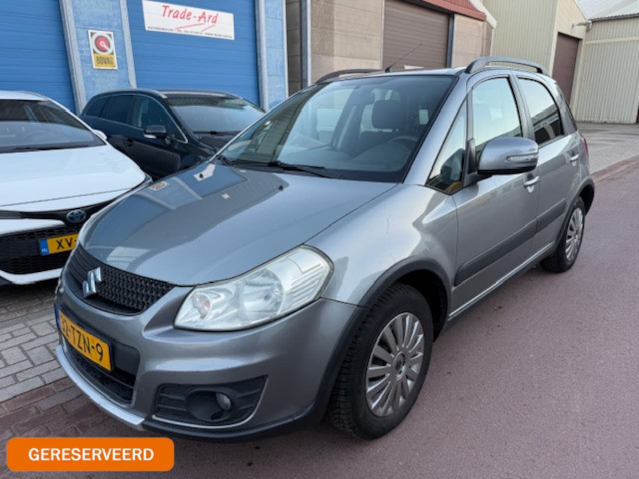 Suzuki SX4 - 1.6 Executive 2012 Navigatie Airco Bluetooth Trekhaak Leuke auto met complete onderhoudshi - AutoWereld.nl