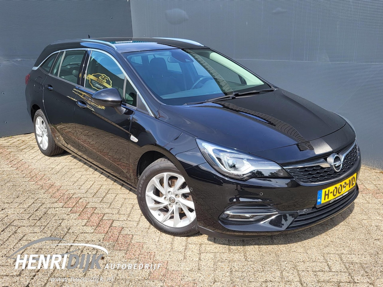 Opel Astra Sports Tourer - 1.2 Elegance Virtual / Navi / Clima / Camera / Trekhaak - AutoWereld.nl