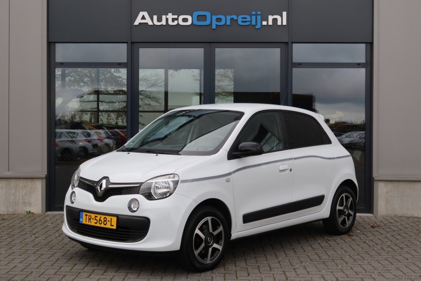 Renault Twingo - 1.0 SCe Limited 71pk Airco, Cruise, PDC, 1e eigenaar - AutoWereld.nl