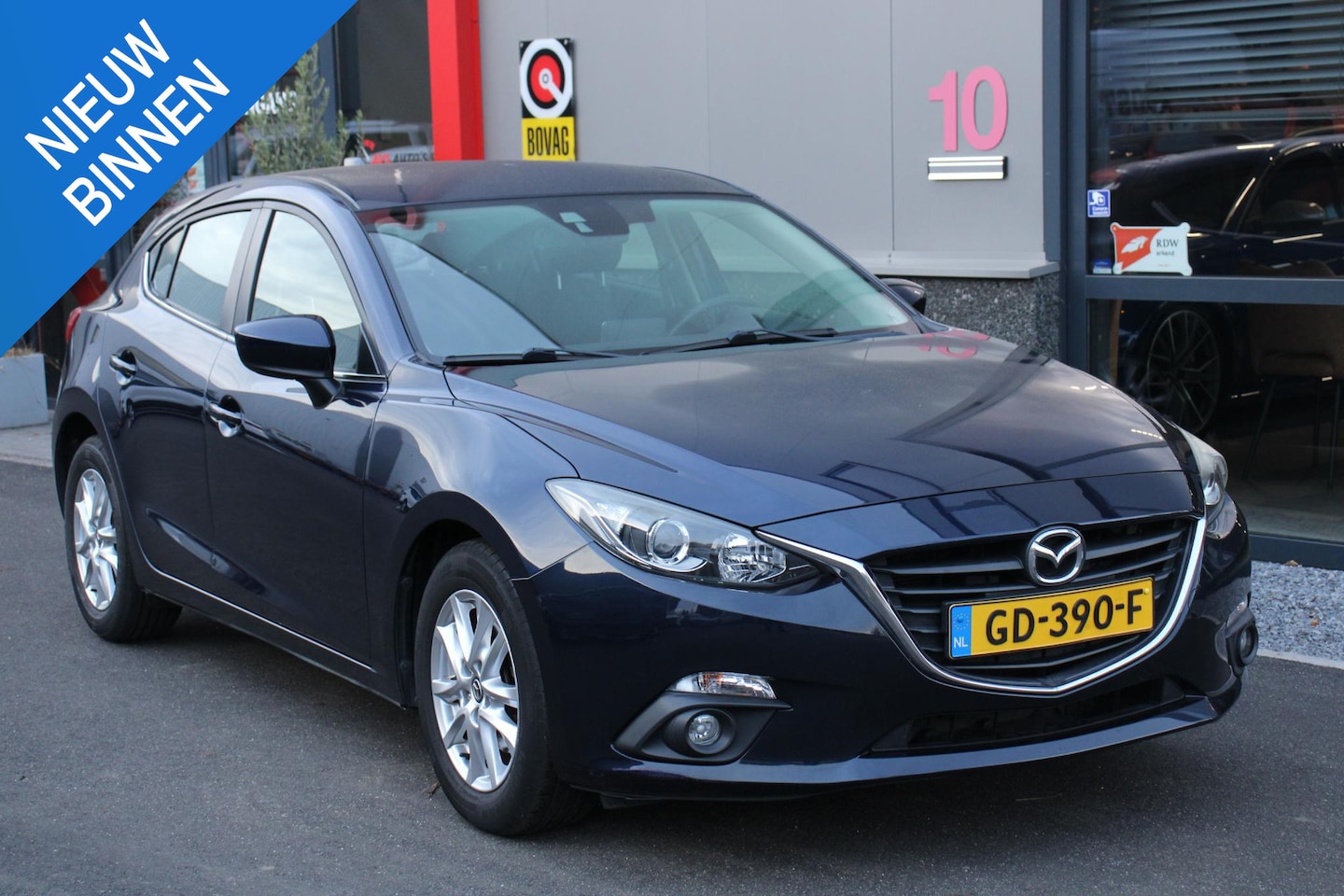 Mazda 3 - 2.0 120PK, NAVI, CLIMA, PDC, 75DKM - AutoWereld.nl