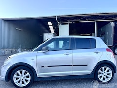 Suzuki Swift - 1.3i 92pk GLS 5drs - nap - airco - camera - touchscreen multimedia - bleutooth - alcantara