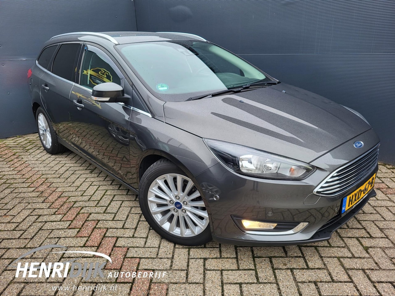 Ford Focus Wagon - 1.0 EcoBoost Titanium Automaat / Camera / Stoelverwarming / Cruise - AutoWereld.nl