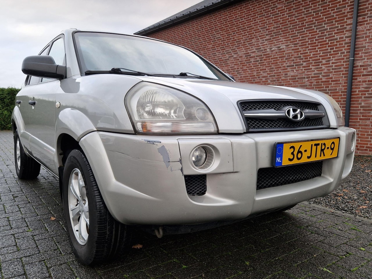 Hyundai Tucson - 2.0i Dynamic Executive 2.0i Dynamic Executive - AutoWereld.nl