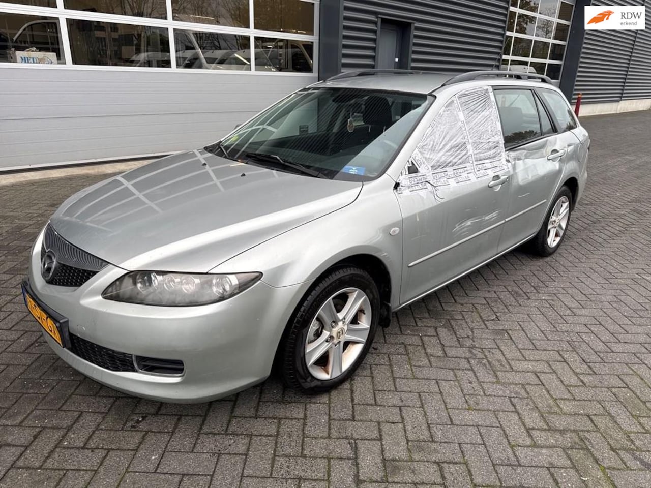 Mazda 6 Sportbreak - 1.8i Touring 1.8i Touring, airco, trekhaak - AutoWereld.nl