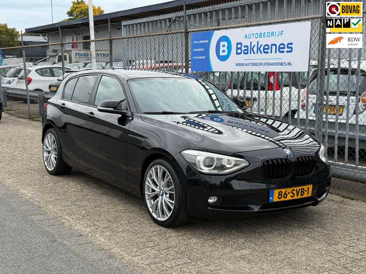 BMW 1-serie - 116i Business | Carplay | Airco | Cruise | Xenon - AutoWereld.nl