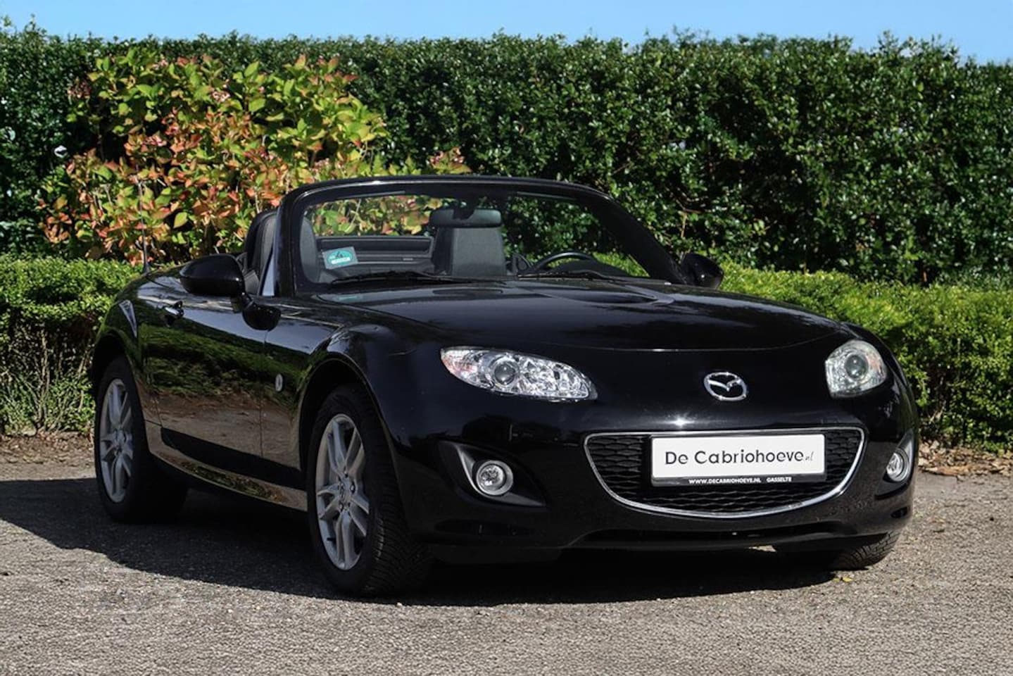 Mazda MX-5 Roadster Coupé - NC 1.8l Stralend Zwart Doorzichtig - AutoWereld.nl