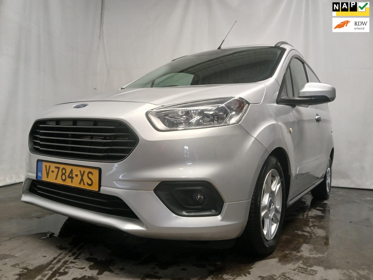 Ford Transit Courier - 1.5 TDCI Limited - Airco - Navi - AutoWereld.nl