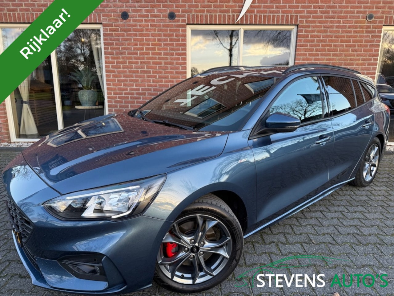 Ford Focus Wagon - 1.5 EcoB. ST L. XBns 150 PK Automaat AFN.TREKHAAK / STOEL&STUUR - AutoWereld.nl