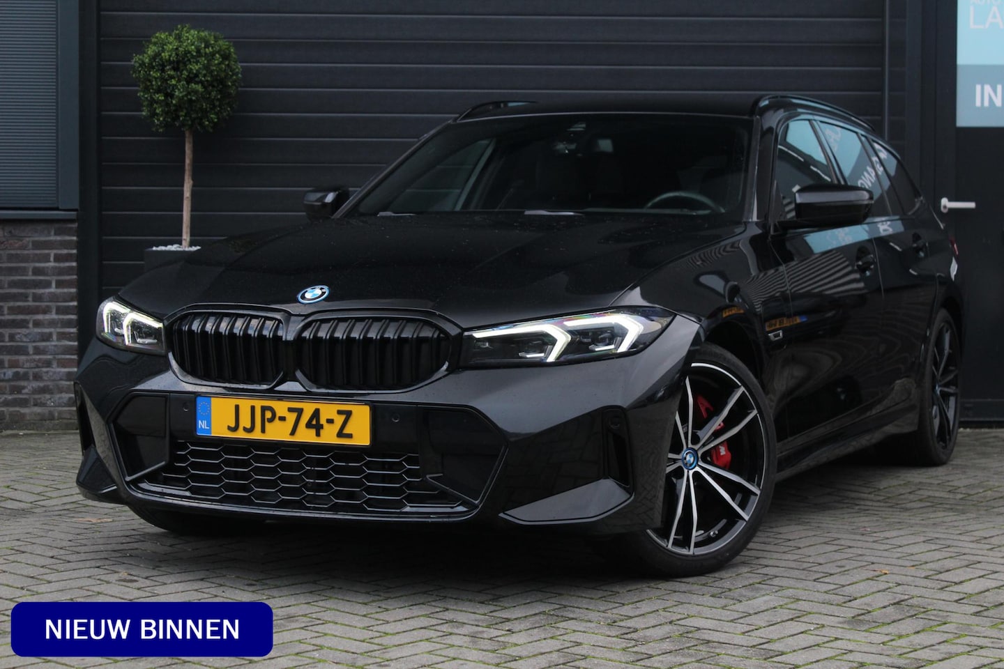BMW 3-serie Touring - 320e M-sport | HUD | 19 Inch | Pro Pakket | BLIS | Keyless - AutoWereld.nl
