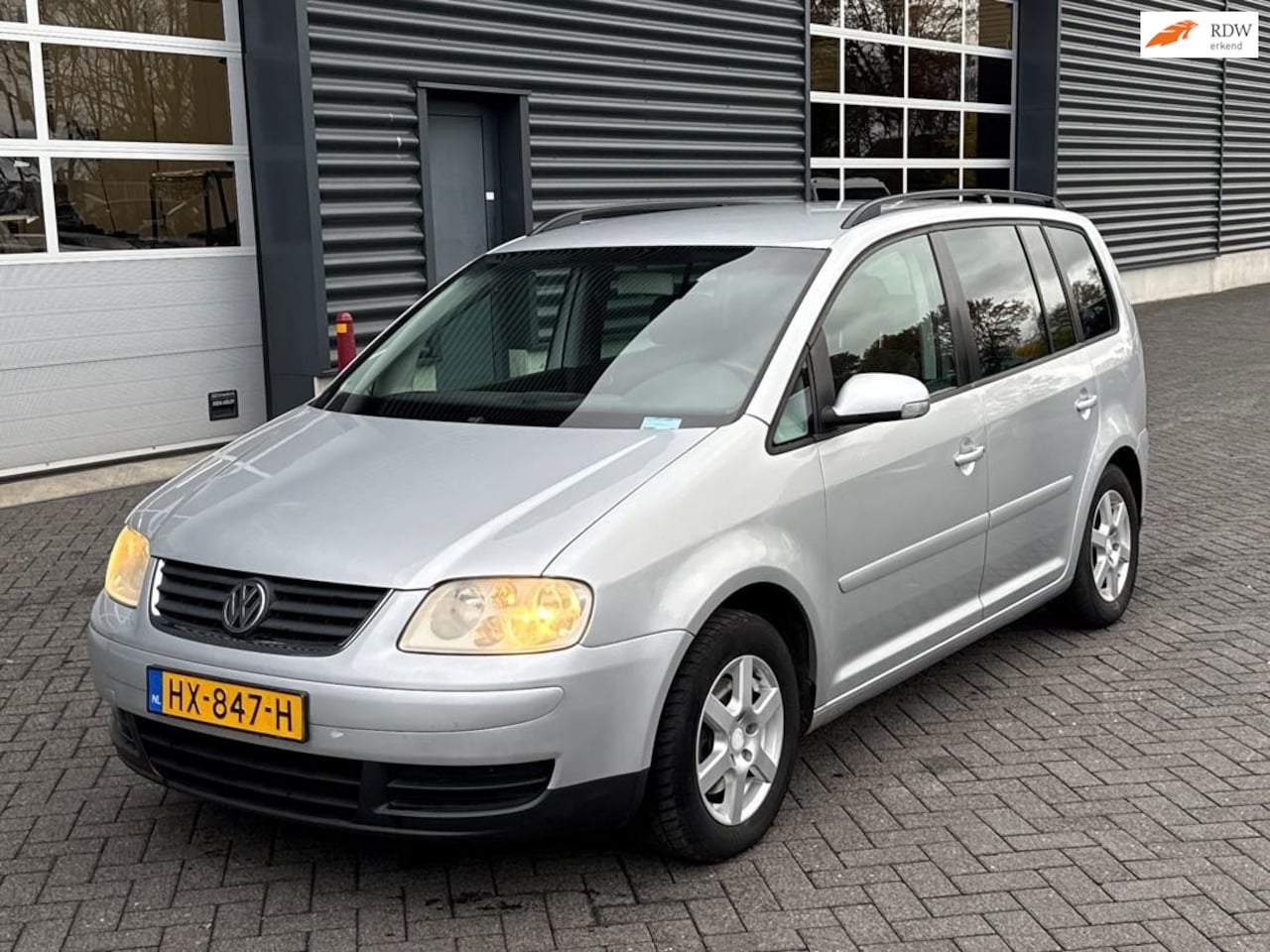 Volkswagen Touran - 1.6-16V FSI 1.6-16V FSI, 7 persoons, airco - AutoWereld.nl