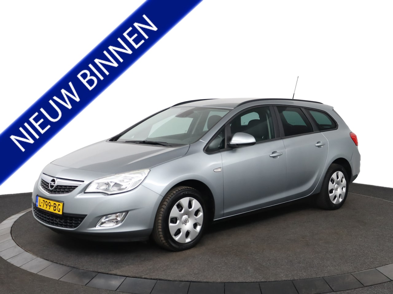 Opel Astra Sports Tourer - | Airco | Cruise | nieuwe D.riem | - AutoWereld.nl