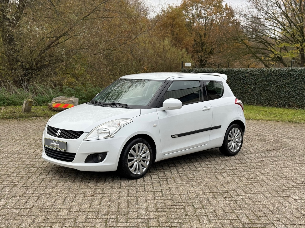 Suzuki Swift - 1.2 Exclusive EASSS CRUISE I SPORTIEF I PARLEMOER I NWE APK - AutoWereld.nl