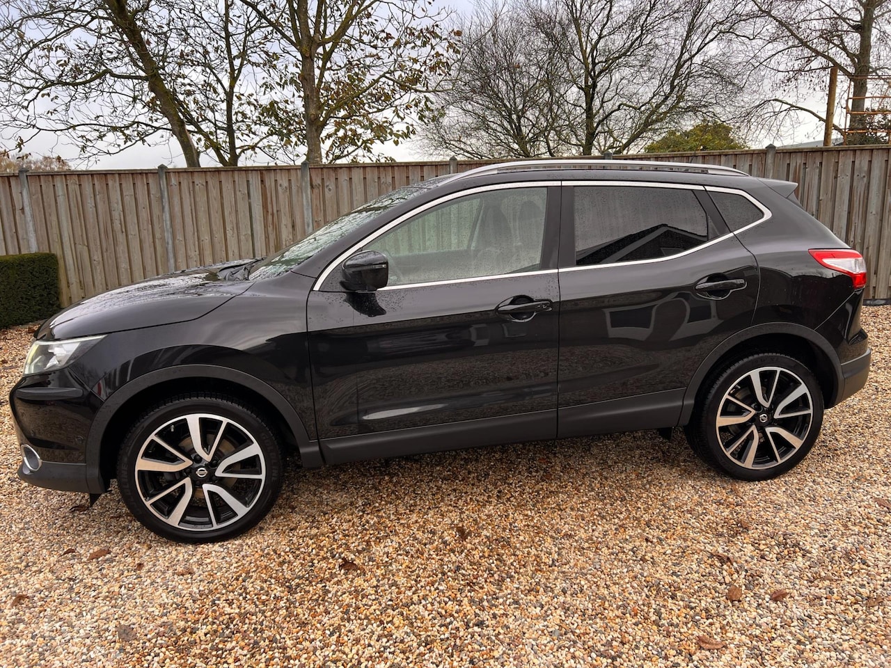 Nissan Qashqai - 1.2 Tekna Navigatie & Camera & Panorama & Leder - AutoWereld.nl